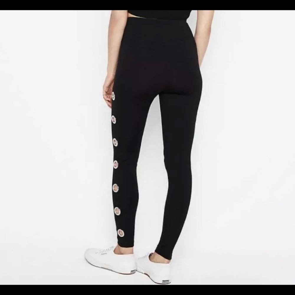 Express leggings w/ silver grommets. Medium
